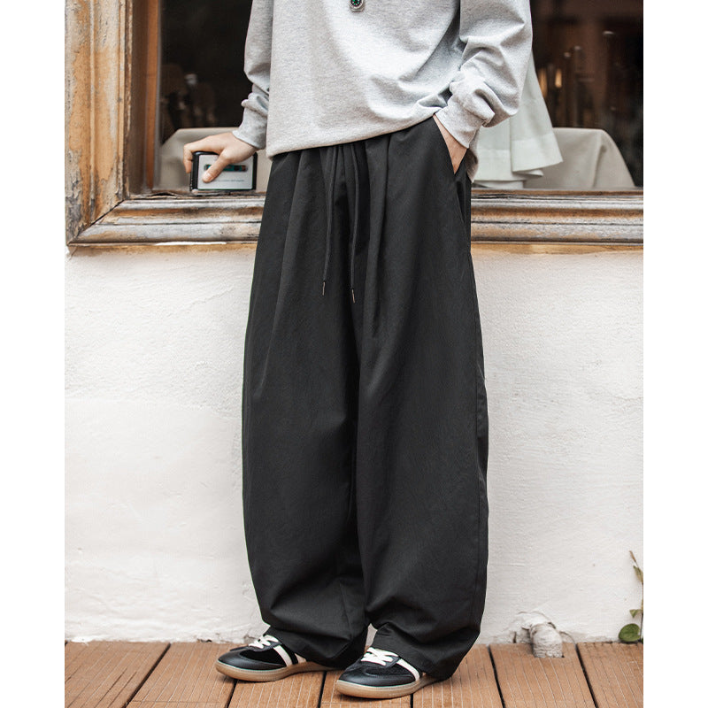 Tapered Trousers With A Drawstring Hem