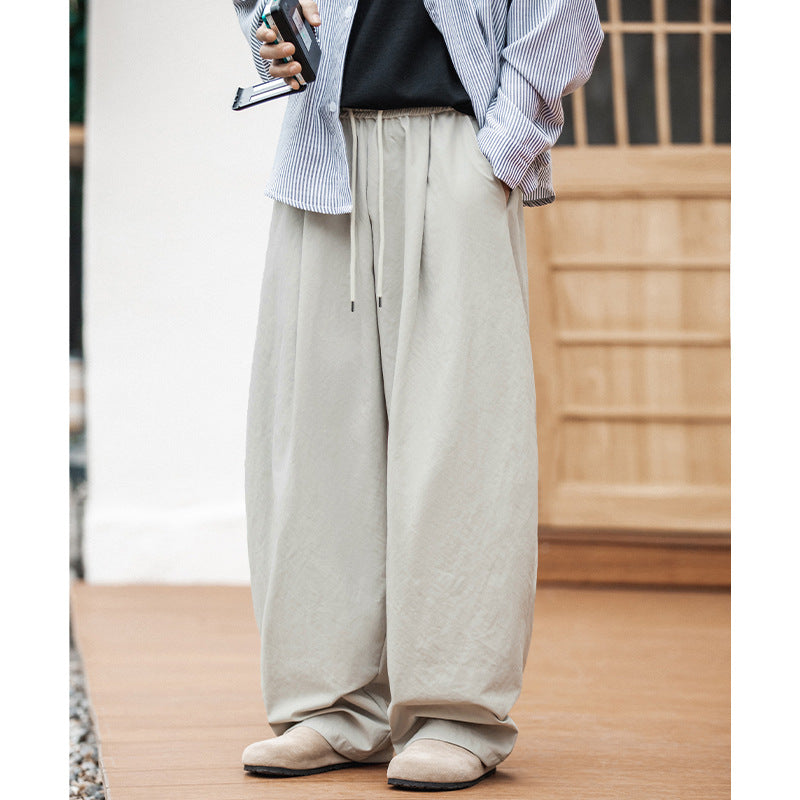 Tapered Trousers With A Drawstring Hem